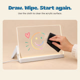 Draw. Wipe. Start again. Use the cloth to clear the acrylic surface.