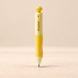 EasyHold Guided Writing Pencil. Sunny Yellow. Clean product photograph on a warm beige studio surface.