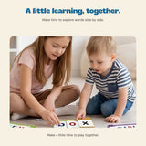 Two children using the existing picture and letter cards together.