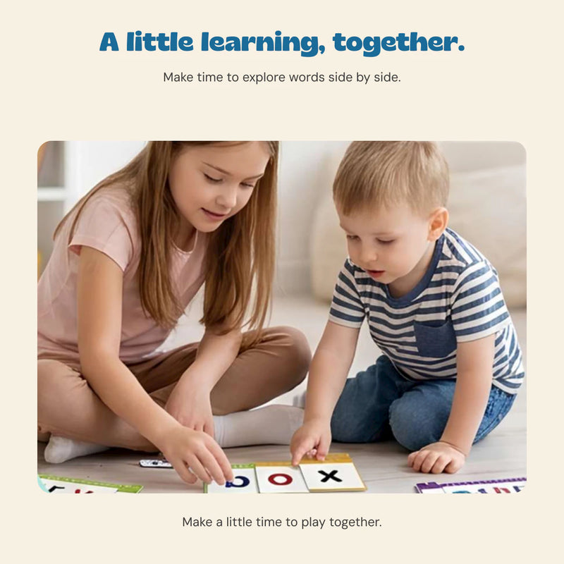 Two children using the existing picture and letter cards together.