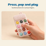 Press, pop and play. Tactile buttons for curious fingers.