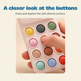 A closer look at the buttons. Press and explore the soft silicone surface.