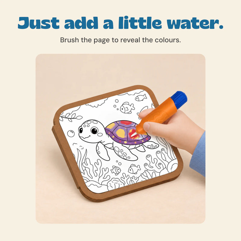 A hand revealing a colourful turtle using the orange water pen.