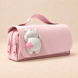 BuddyPack Large Pencil Case. Pink Bunny Buddy. Clean product photograph on a warm beige studio surface.