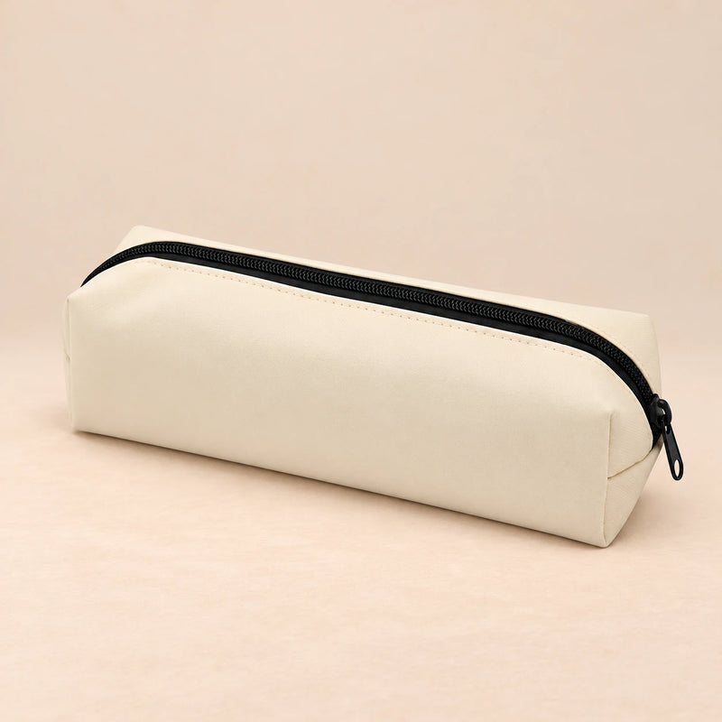 Everyday Pencil Pouch. Clean product photograph on a warm beige studio surface.