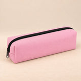 Everyday Pencil Pouch. Blush Pink. Clean product photograph on a warm beige studio surface.