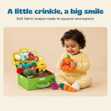 A little crinkle, a big smile. Soft fabric shapes made to squeeze and explore.