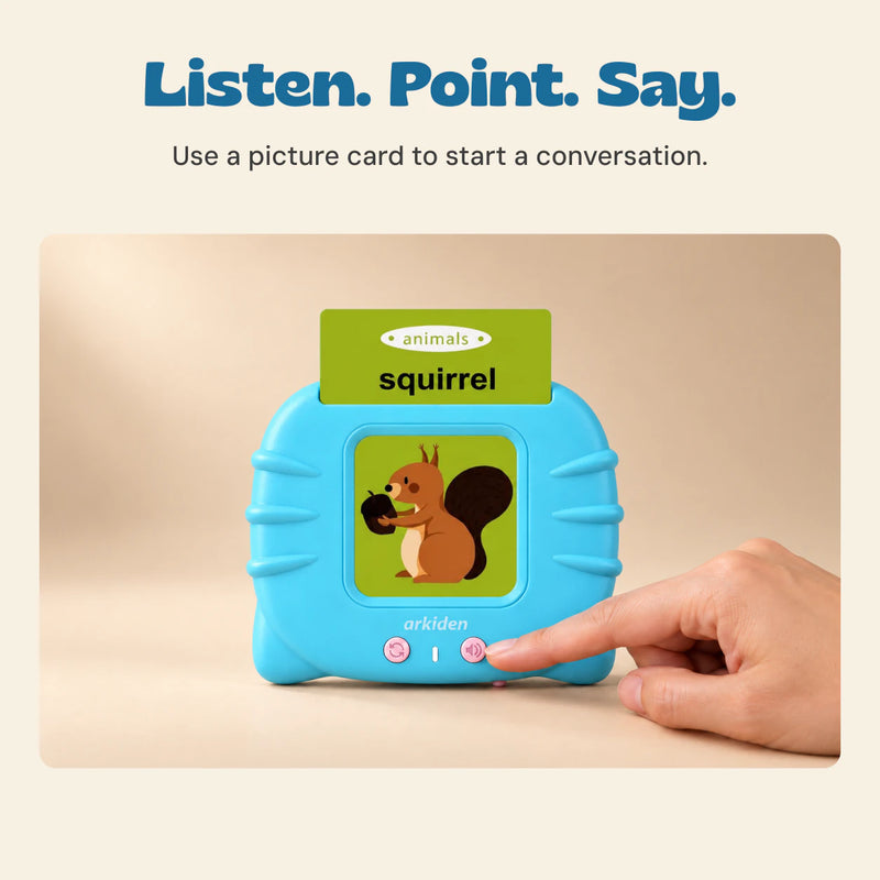 An adult finger presses the button on the blue reader with the exact squirrel picture card inserted.