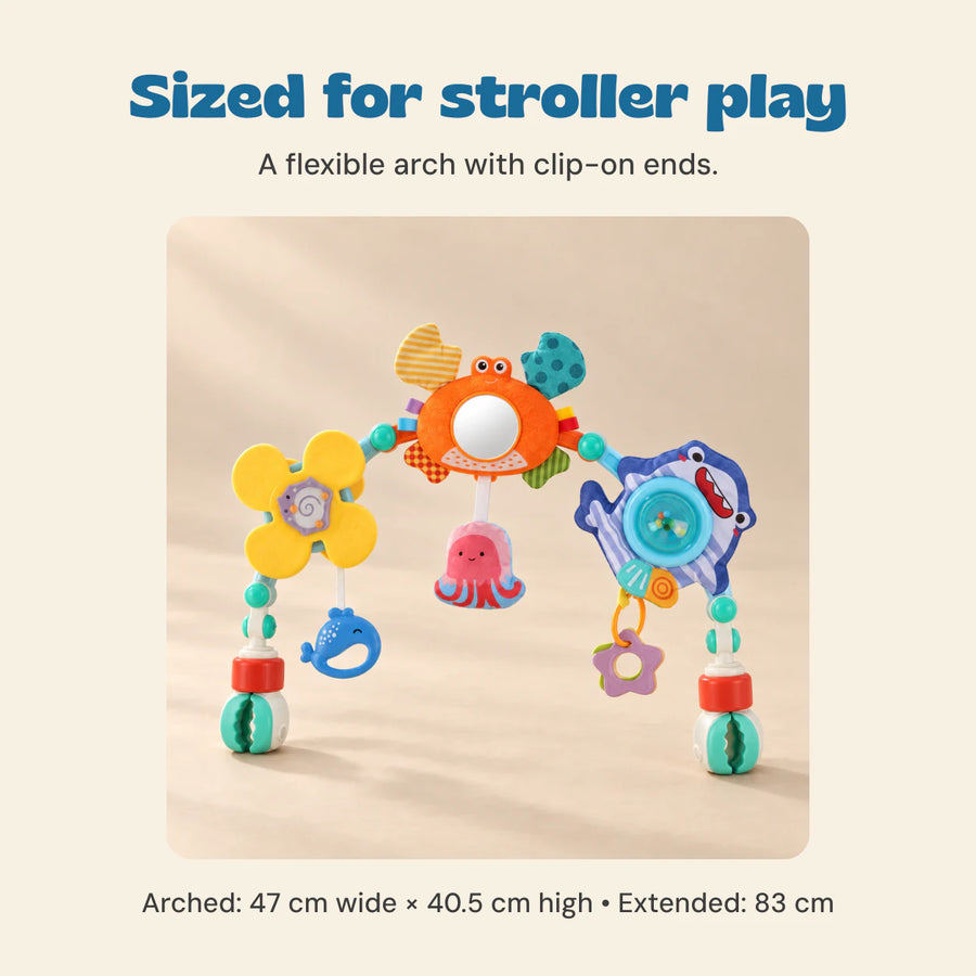 Sized for stroller play. A flexible arch with clip-on ends.