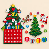 Felt Christmas countdown tree with 24 pockets beside the separate Fridge Christmas Scene magnet set on warm beige.