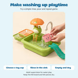 Adult hands rinse a toy pink cup under the Froggy Wash Station faucet. Felt pieces stay dry.