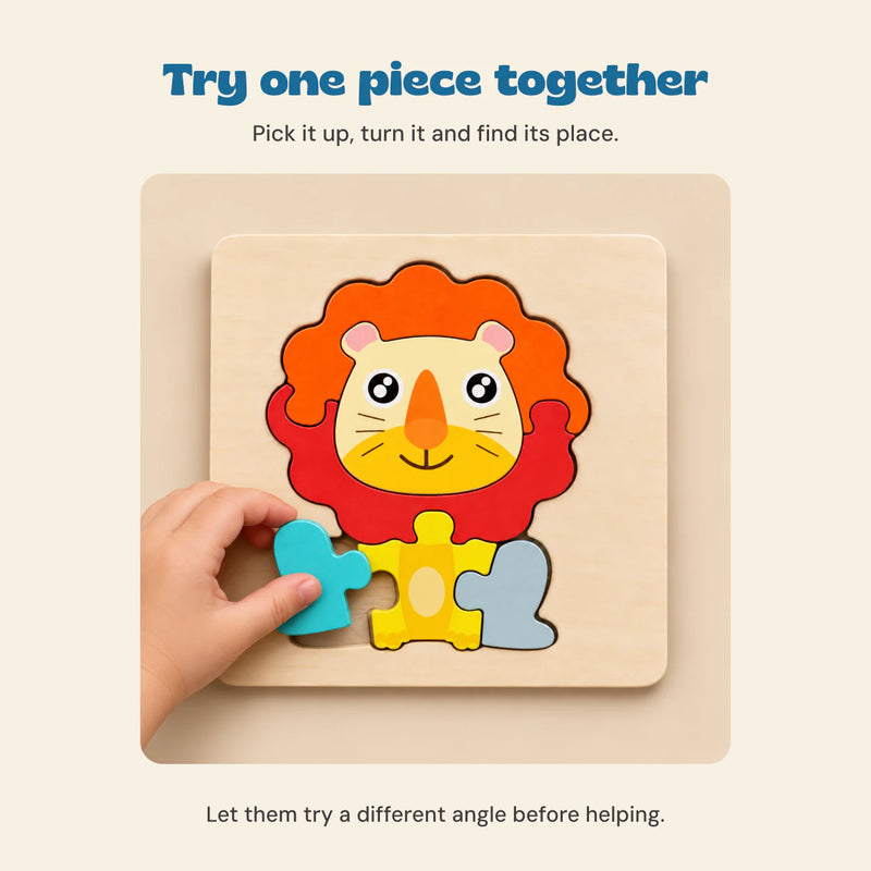 A hand placing the turquoise piece in the Lion wooden puzzle. Play idea: pick up, turn and fit one piece at a time.