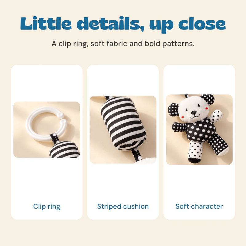 Close views of the white clip ring, striped cushion and patterned bear fabric.