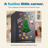 The original Christmas magnetic scene arranged on a refrigerator in a softly lit festive room.