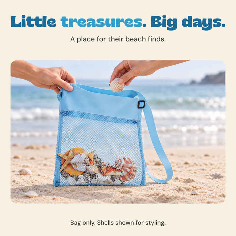 Adult hands place a shell into the blue mesh beach bag beside the sea. Shells shown for styling, bag only.