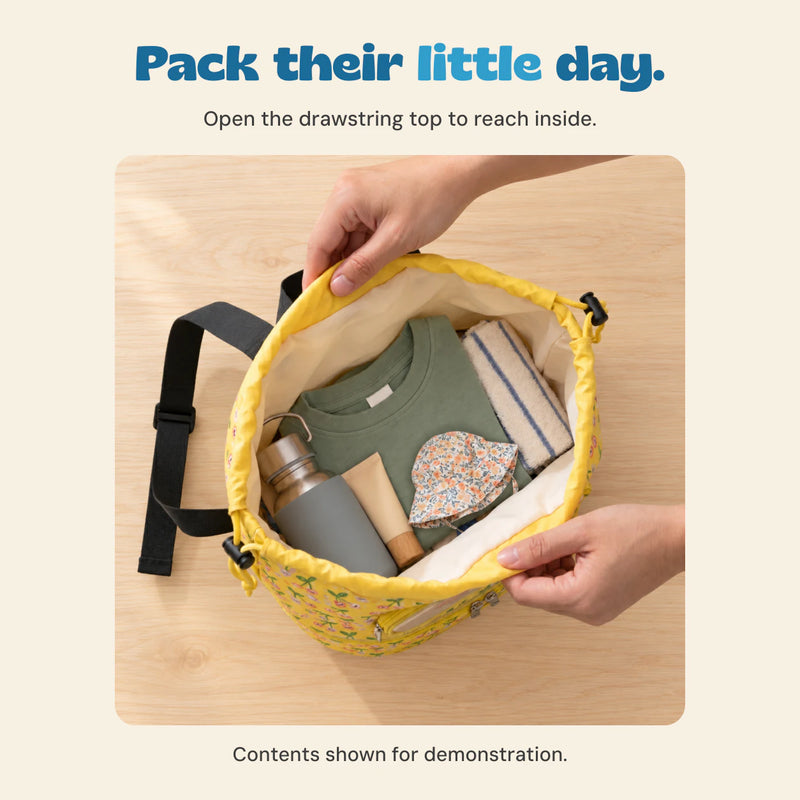 Open the drawstring top to reach inside. Contents shown for demonstration.