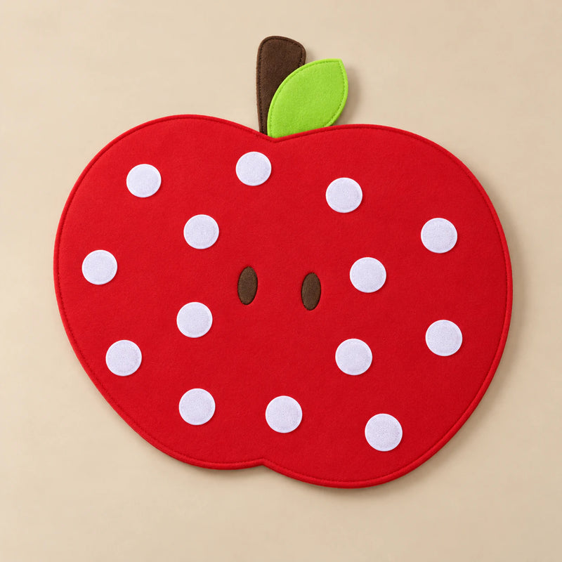Red apple-shaped felt activity board with white attachment patches, board only.