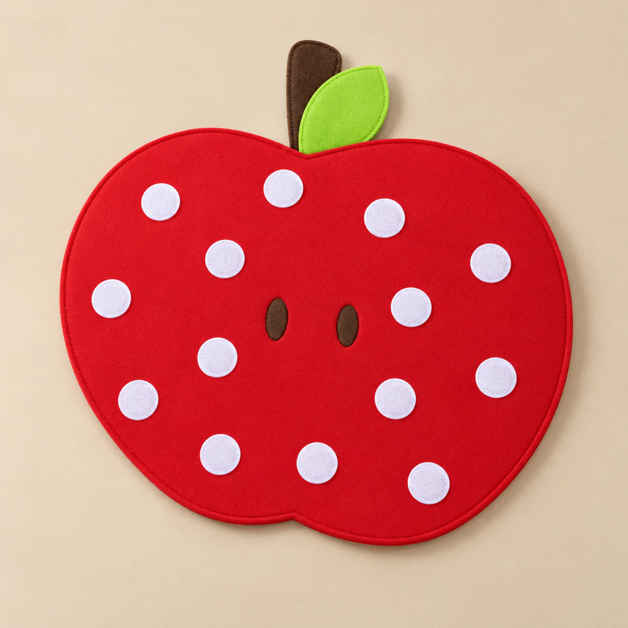 Red apple-shaped felt activity board with white attachment patches, board only.