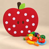 Apple felt activity board with the supplied pretend food and play utensils.