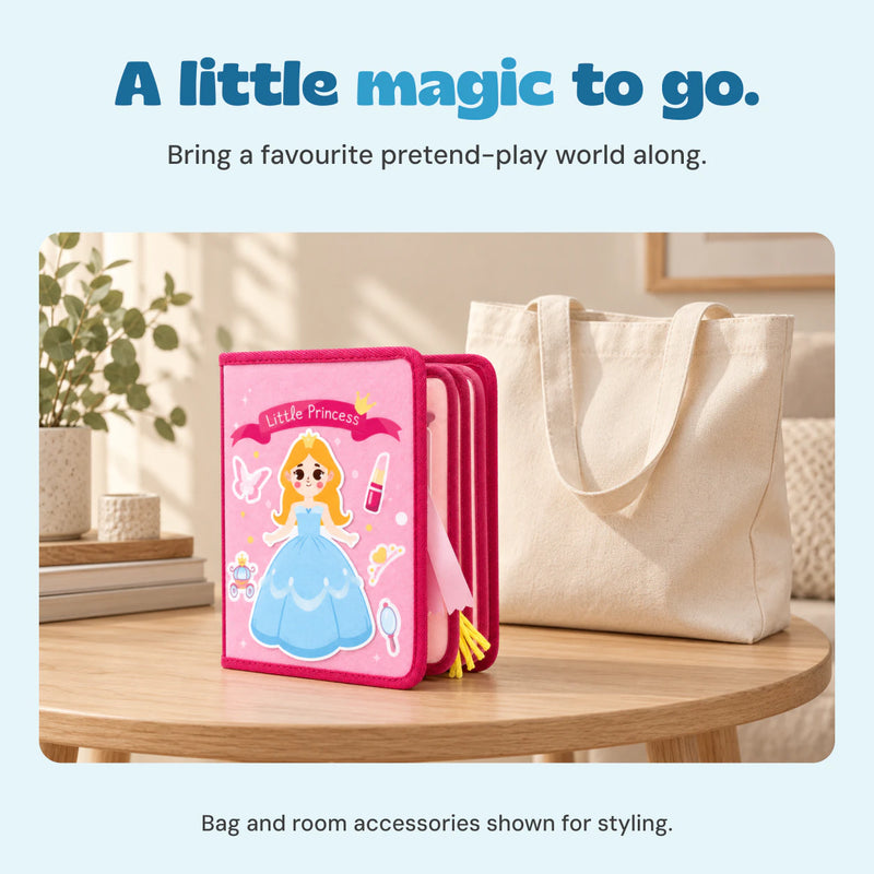 Closed Little Princess busy book on an oak table beside a cream tote bag.
