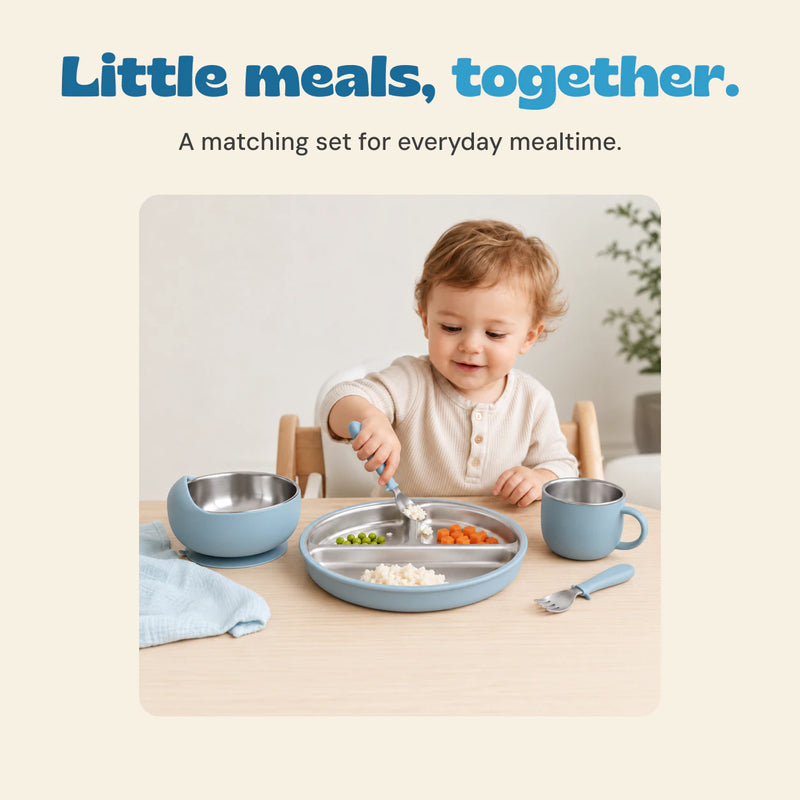 The existing source child scoops rice with the Sky Blue spoon, beside the matching bowl, three-section plate, cup and fork.