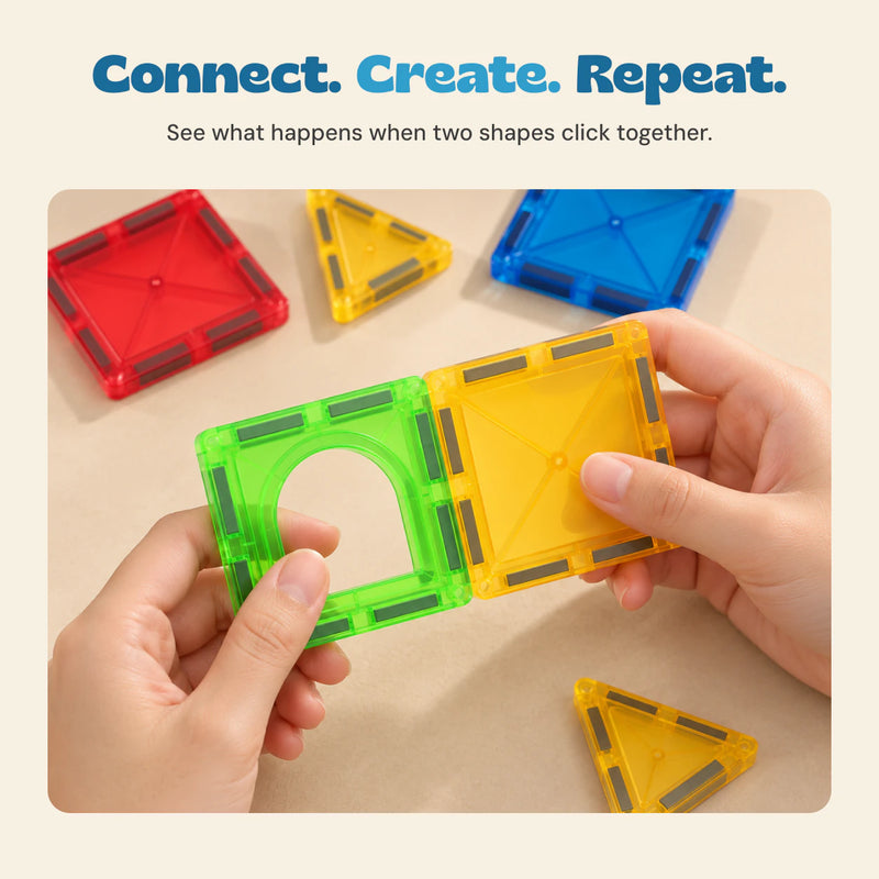 Hands connecting a green arch tile and a yellow square magnetic tile.