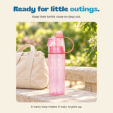 Keep their bottle close on days out. A carry loop makes it easy to pick up.