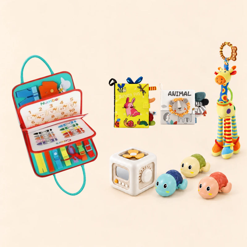 Rocket Green Plus busy board with a busy cube, Garden Fun cloth book, Animal lion soft book, giraffe rattle and three turtle bath toys on a pale beige background.