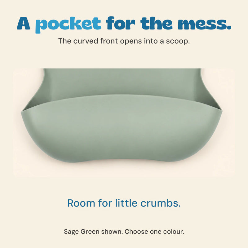 Close view of the sage silicone bib catch pocket and curved sides.