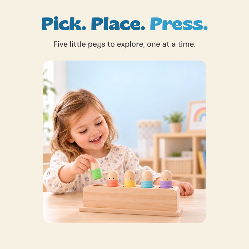 A child holds the mint peg above the wooden five-hole base, beside the other four pastel pegs.