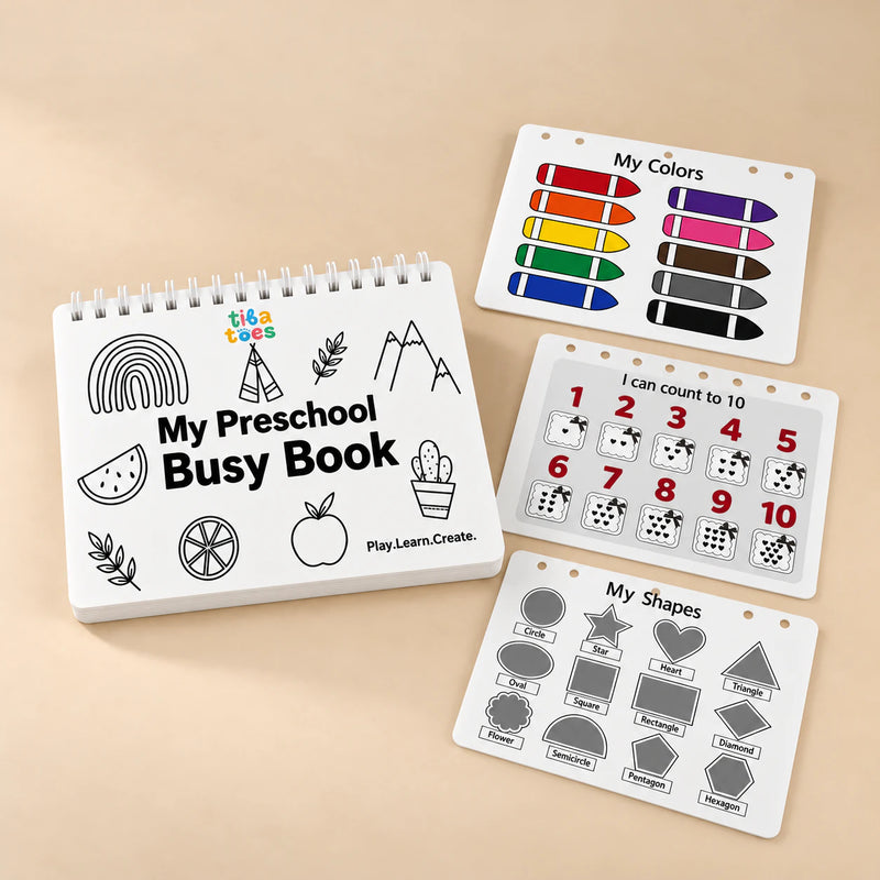 White TibaToes Preschool Busy Book with colours, counting and shapes page previews arranged on a warm beige studio surface