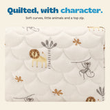 Close view of the cream pouch with quilted curved stitching, small animal print and top zipper.