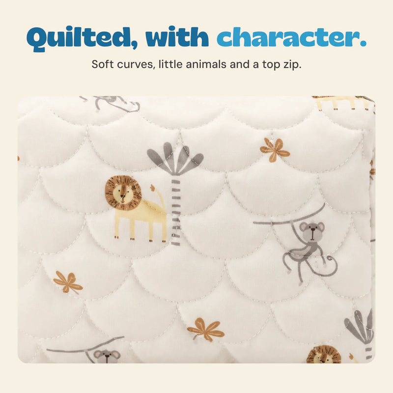 Close view of the cream pouch with quilted curved stitching, small animal print and top zipper.
