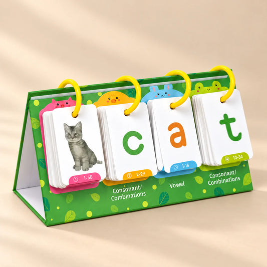CVC WordPlay Flip Book showing cat and the letters c, a and t, with grounded soft shadows on a warm beige studio surface.