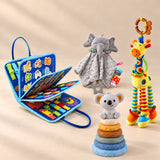 Calm and Focus Bundle with a blue vehicle busy board, elephant comforter, giraffe rattle and six-ring koala stacker in the beige studio.