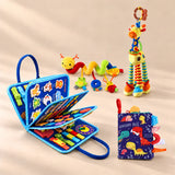 Vehicle Blue Plus busy board with a dinosaur sensory book, giraffe rattle and spiral toy on a warm beige studio floor.