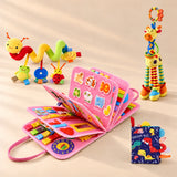 Mermaid Pink Plus busy board with a dinosaur sensory book, giraffe rattle and spiral toy on a warm beige studio floor.
