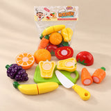 TibaToes Little Chef Cutting Play Set photographed with its matching design and colours on a warm beige studio surface.