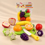 TibaToes Little Chef Cutting Play Set photographed with its matching design and colours on a warm beige studio surface.