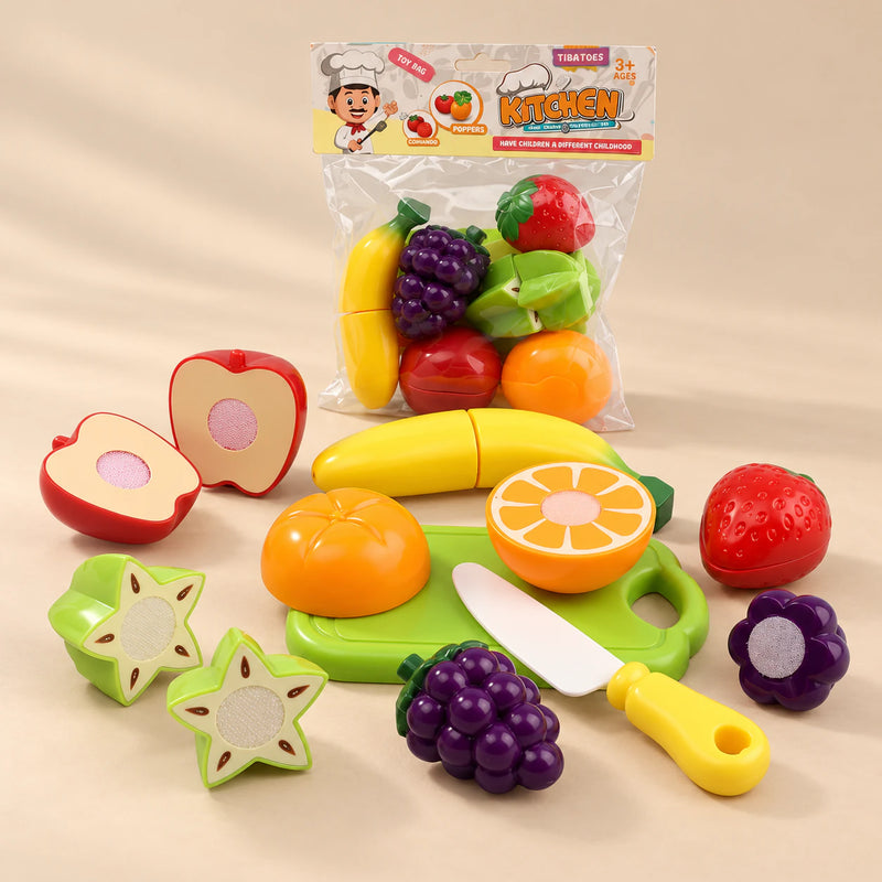 TibaToes Little Chef Cutting Play Set photographed with its matching design and colours on a warm beige studio surface.