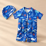 TibaToes™ FloatPal Kids Buoyancy Swimsuit photographed with its matching design and colours on a warm beige studio surface.
