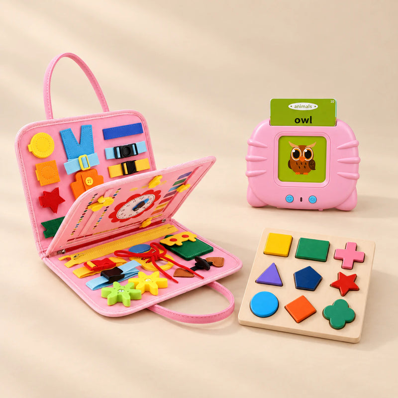 Focus Foundations Bundle with its colour-matched busy board, talking flashcards and shape puzzle on a warm beige studio surface.