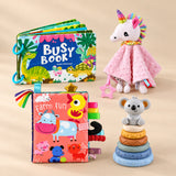 After-School Calm-Down Kit with its matching toys and books arranged together on a softly lit warm beige studio surface.