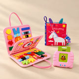 Grandparent Gift Bundle with a mermaid pink busy board, pink talking flashcard reader and Magical Unicorns sensory book on a beige studio surface.