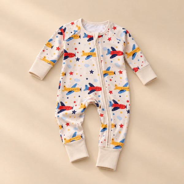 Soft Zip Baby Romper, showing its actual design with soft shadows on a seamless warm beige studio surface.