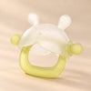 Soothing Baby Gum Teether on a warm beige studio background
