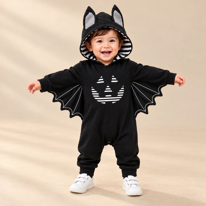 Little Bat Hooded Romper on a warm beige studio background