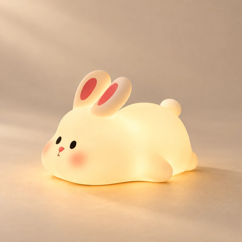 CuddleGlow Animal Night Light on a warm beige studio background