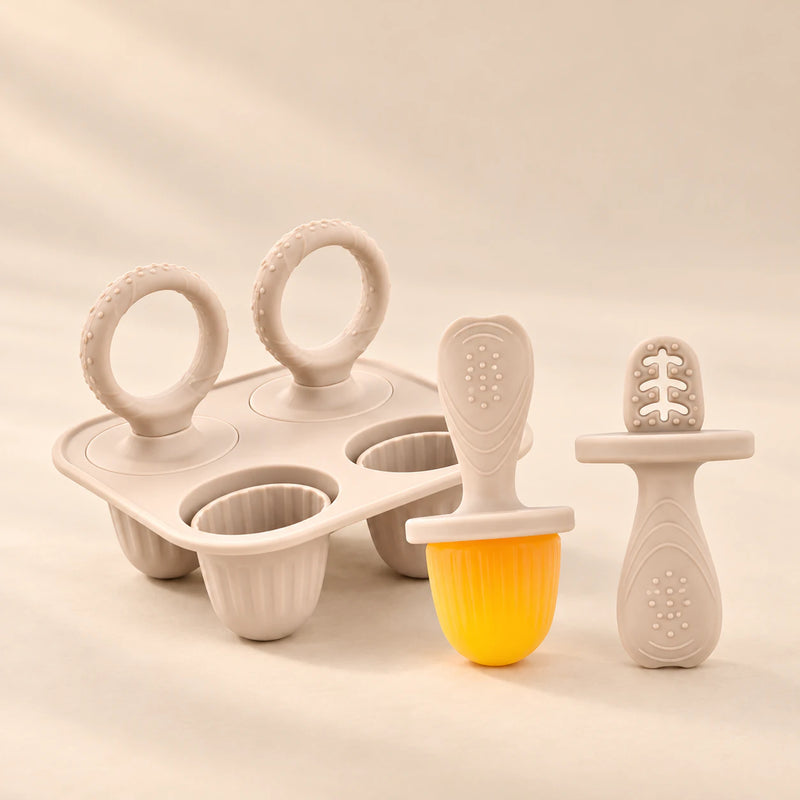 Little Bites Silicone Feeder & Teether Set on a warm beige studio background in Oat Beige Set