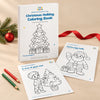 Christmas Holiday Coloring Book cover from the selected PDF with tree and Santa page previews, red ribbon and small festive accents on a beige studio surface.